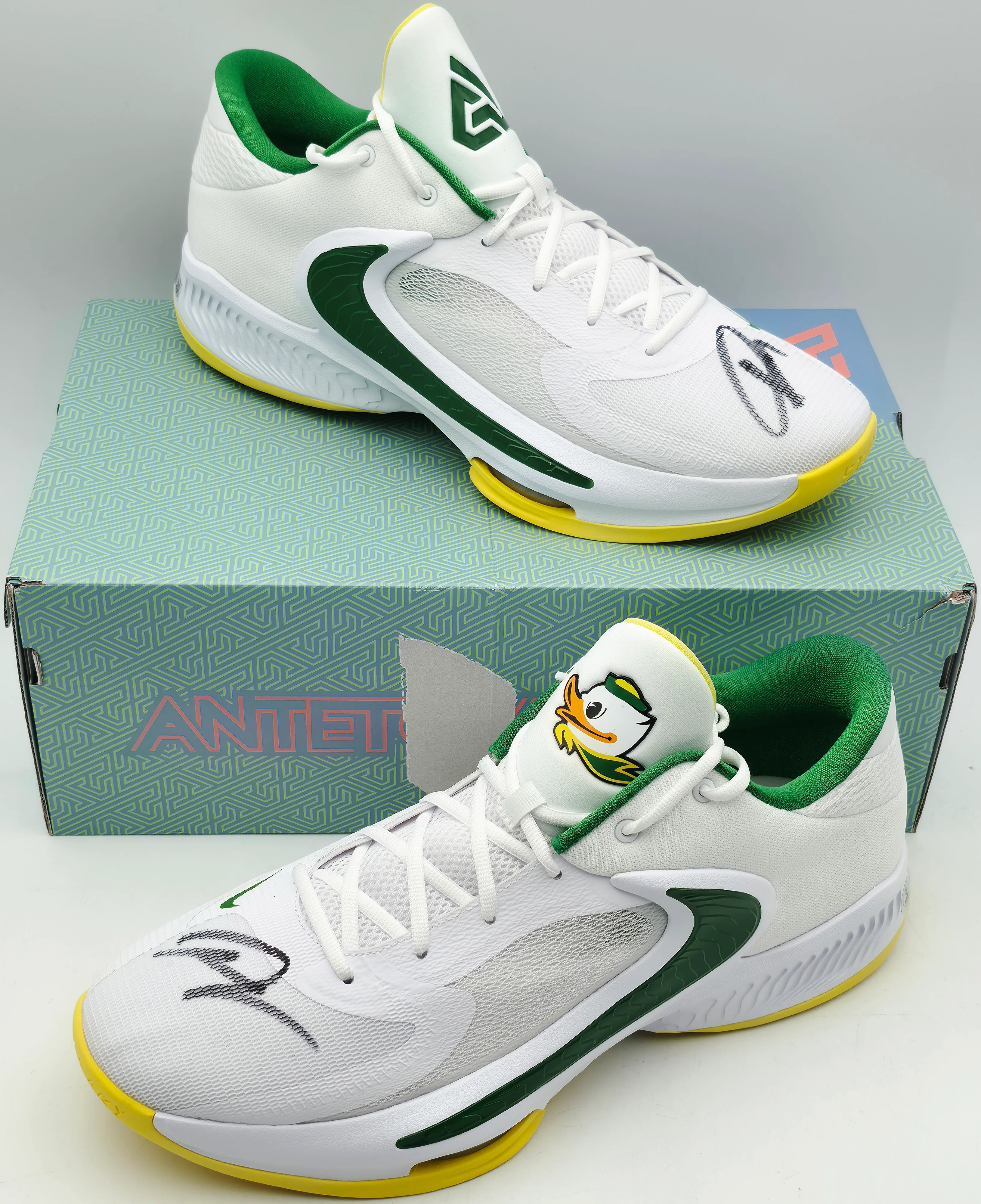 Giannis Antetokounmpo Autographed 2022 Player Exclusive (PE) Promo Oregon White & Green Nike Zoom Freak 4 NCAA SOS Shoes Size 16 (With Box) Beckett BAS Witness #3W396811 & #3W396812