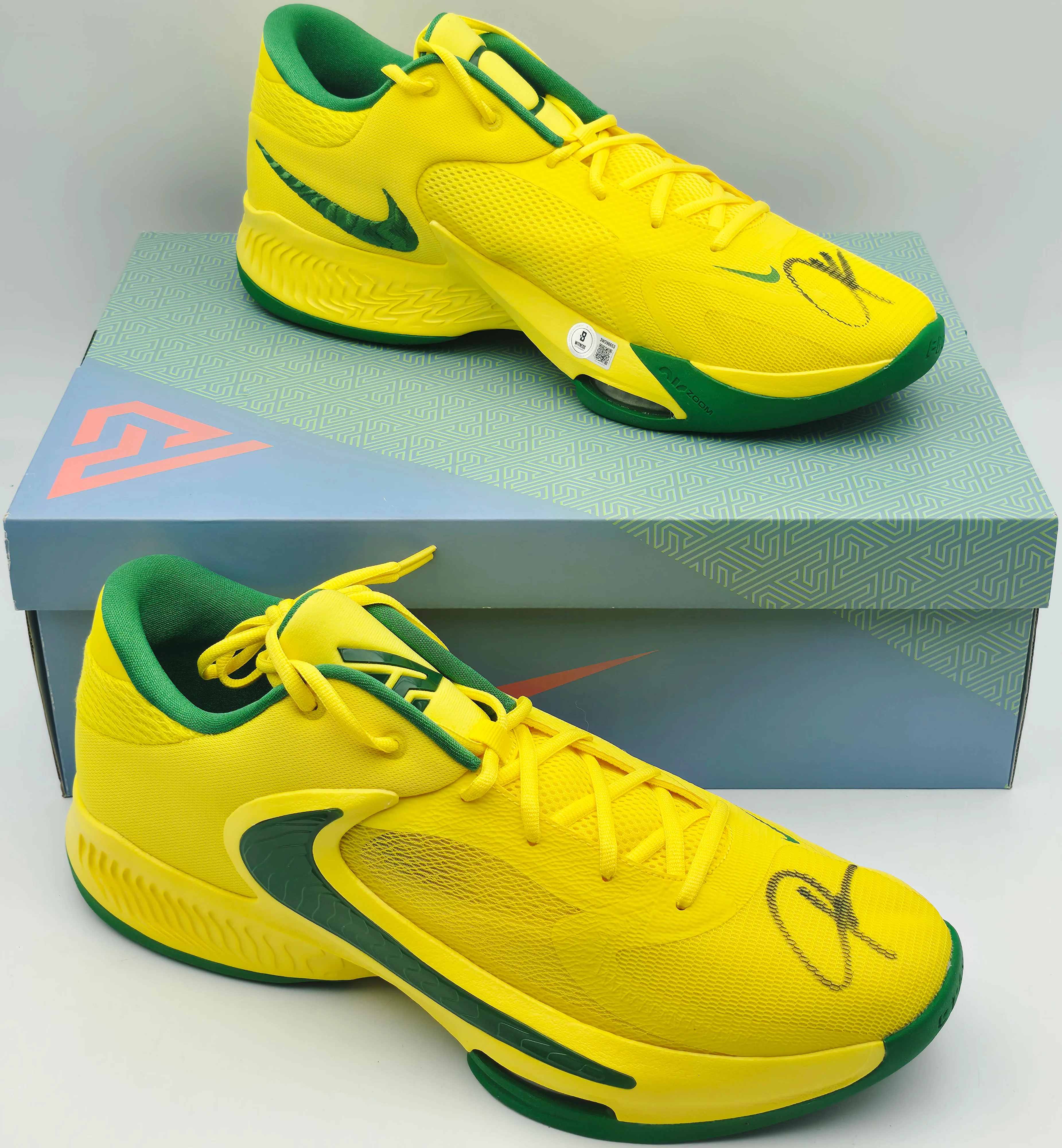 Giannis Antetokounmpo Autographed 2022 Player Exclusive (PE) Promo Oregon Yellow Strike & App Nike Zoom Freak 4 NCAA SOS Shoes Size 17 (With Box) Beckett BAS Witness #3W396652 & #3W396653