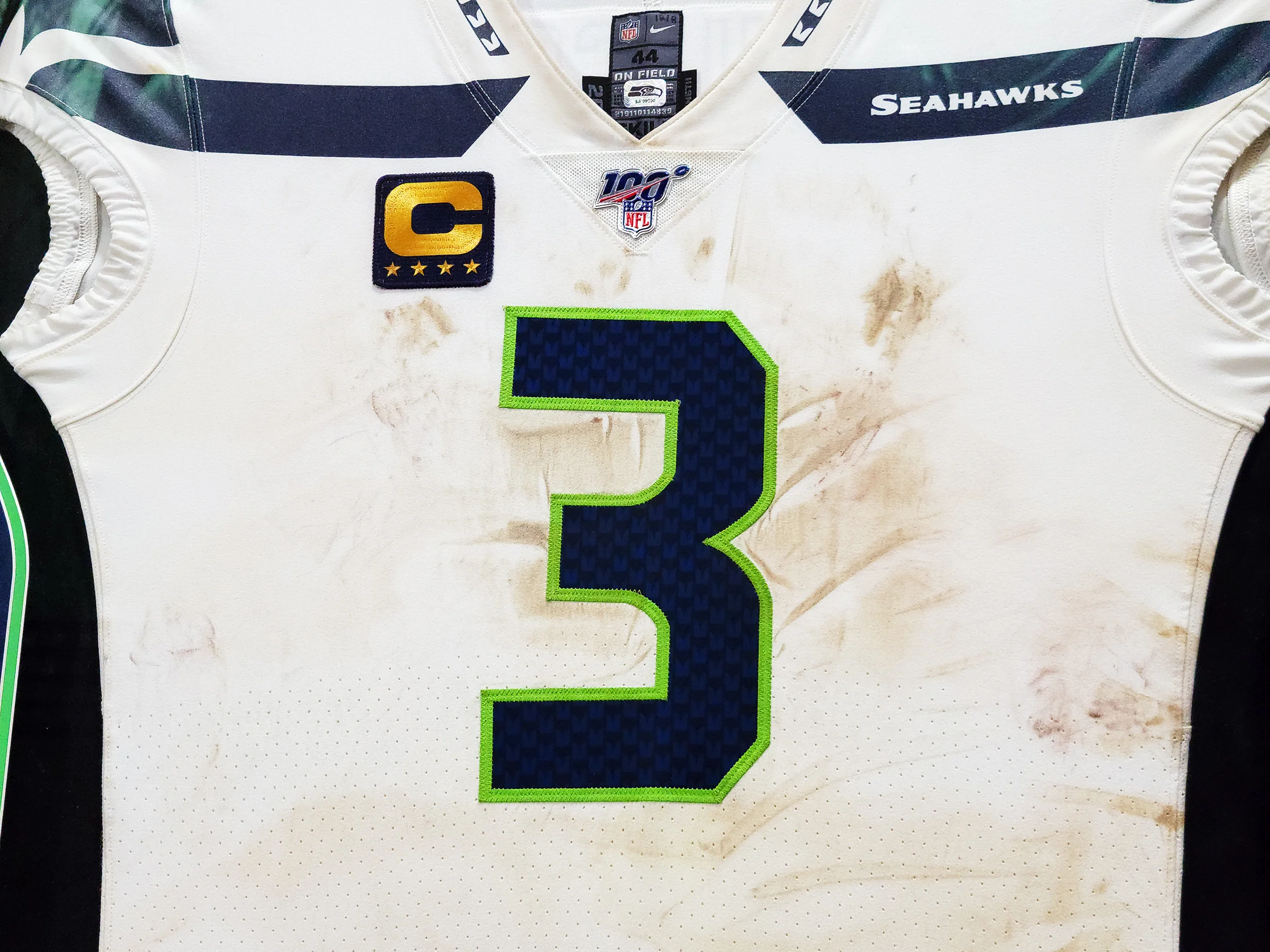 Russell Wilson Framed Game Used Seattle Seahawks White Nike Jersey With Captain's Patch & NFL 100 Logo Unsigned SKU #203517 - Image 3