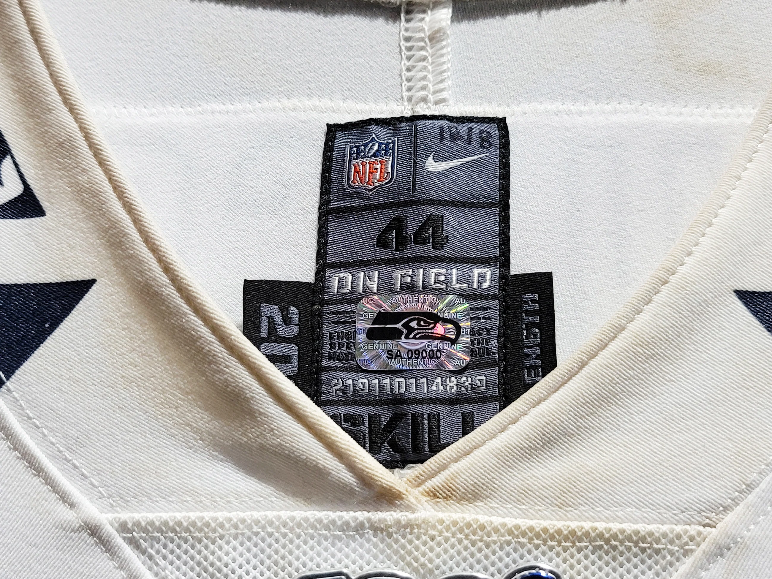 Russell Wilson Framed Game Used Seattle Seahawks White Nike Jersey With Captain's Patch & NFL 100 Logo Unsigned SKU #203517 - Image 5